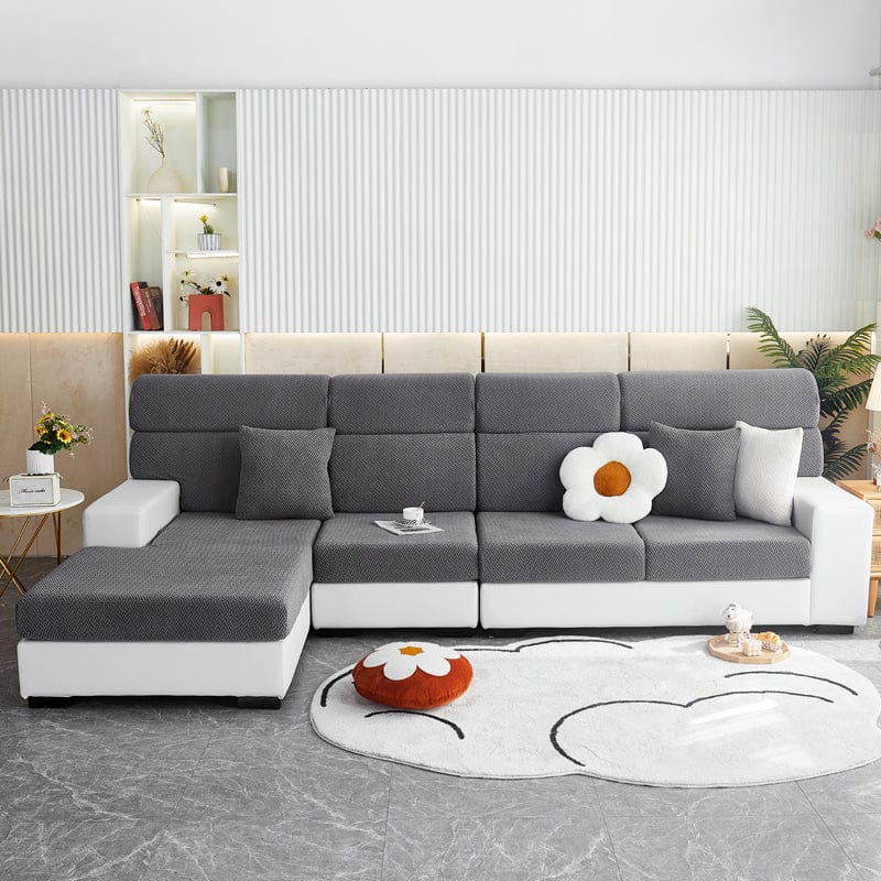Funda de cojín de sofá de polar, Gris trenzado, colocada en los cojines de asiento y respaldo de un sofá