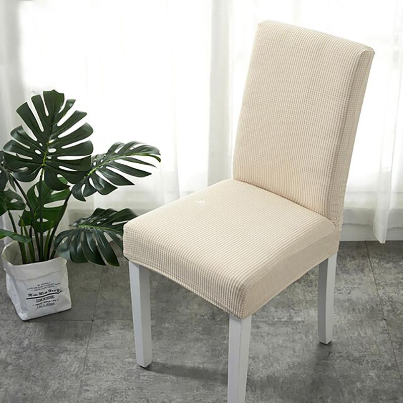 Funda de silla de comedor repelente al agua, Blanco roto, colocada en una silla