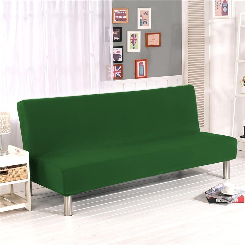 Funda de sofá cama clic clac elástica, Verde, colocada en un sofá cama clic clac