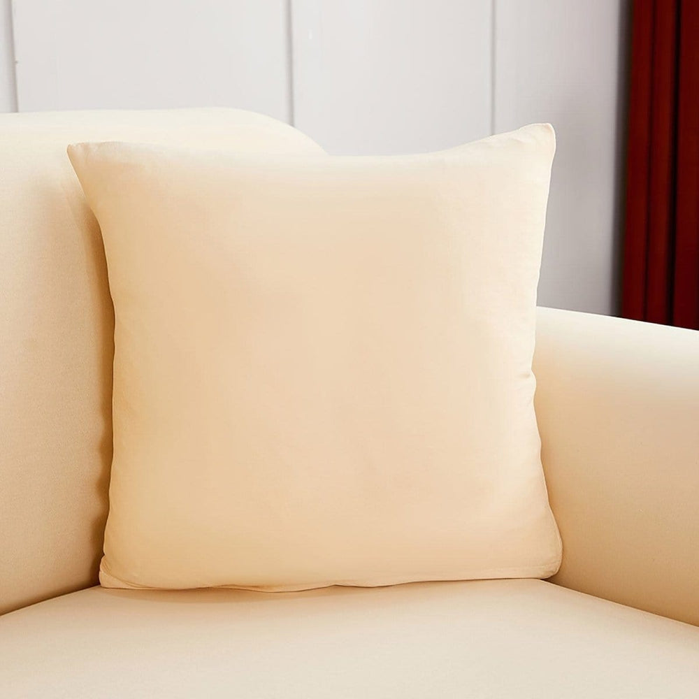 Fundas de cojín elásticas 45 × 45 cm — pack de 2, Beige, colocadas en un sofá