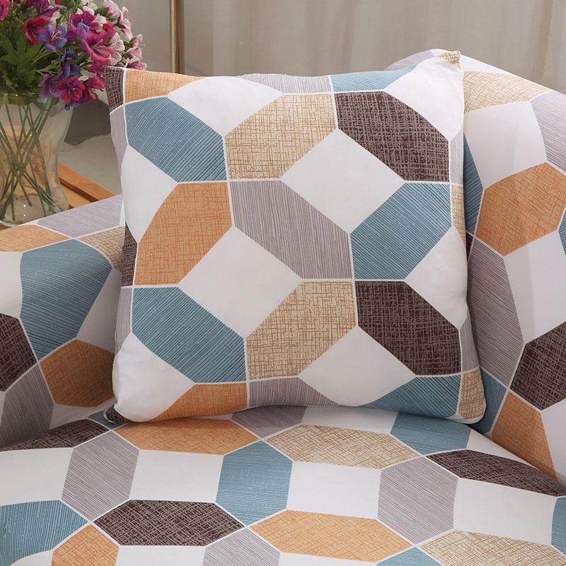 Fundas de cojín elásticas 45 × 45 cm — pack de 2, Geométrico terracota y azul, colocadas en un sofá