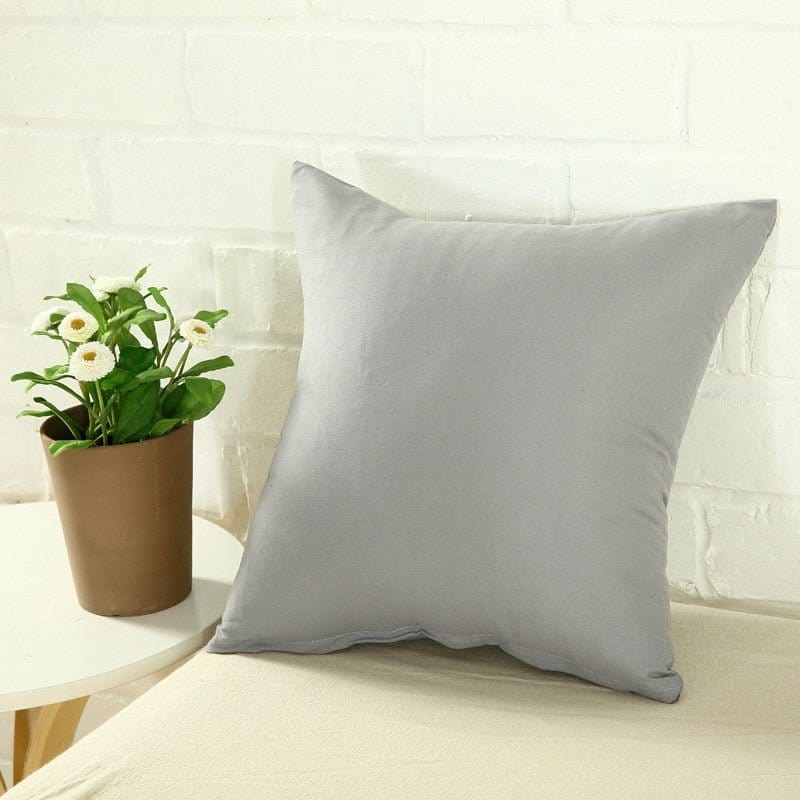 Fundas de cojín elásticas 45 × 45 cm — pack de 2, Gris claro, colocadas en un sofá
