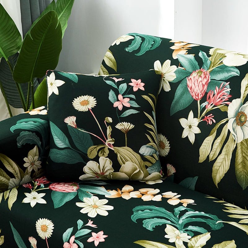 Fundas de cojín elásticas 45 × 45 cm — pack de 2, Negro floral tropical, colocadas en un sofá