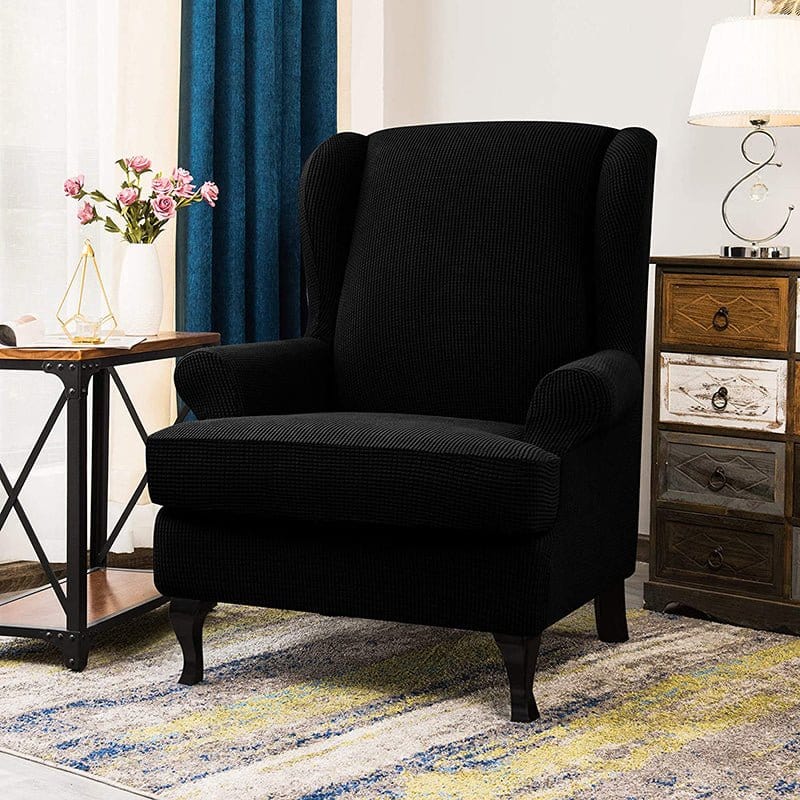 Funda de sillón orejero repelente al agua, Negro, colocada en un sillón orejero